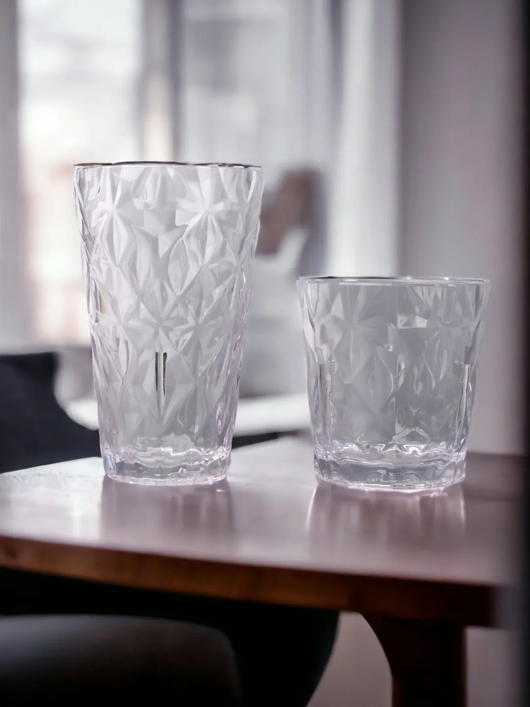 Stack of four stylish shatterproof glasses